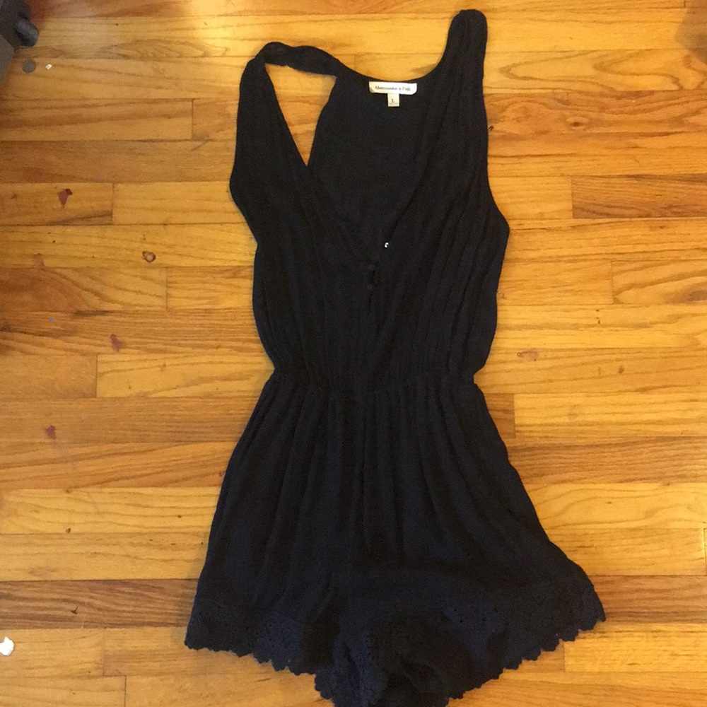 Black romper with lace trim